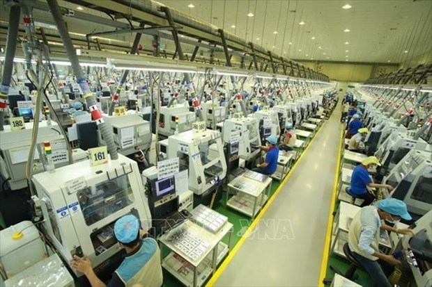 Dây chuyền sản xuất linh kiện điện tử tại Công ty TNHH Bokwang Vina. (Ảnh: TTXVN)
