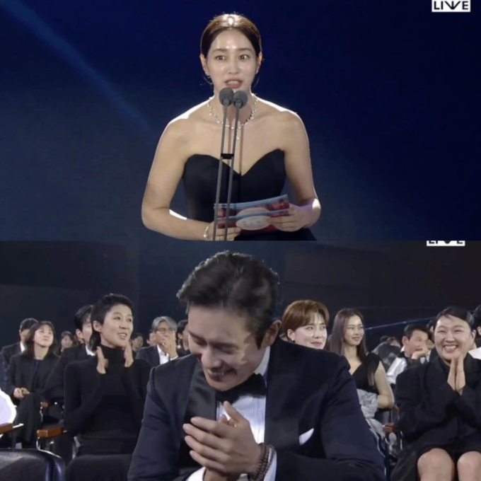 Lee Byung Hun vừa cười vừa xấu hổ khi bị bắt cận cảnh biểu cảm lúc Lee Min Jung lên sân khấu