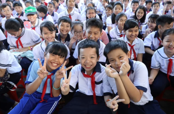 Học sinh trường Tiểu học Lê Văn Thọ, quận Gò Vấp, TP HCM trong lễ khai giảng. Ảnh: Hữu Khoa