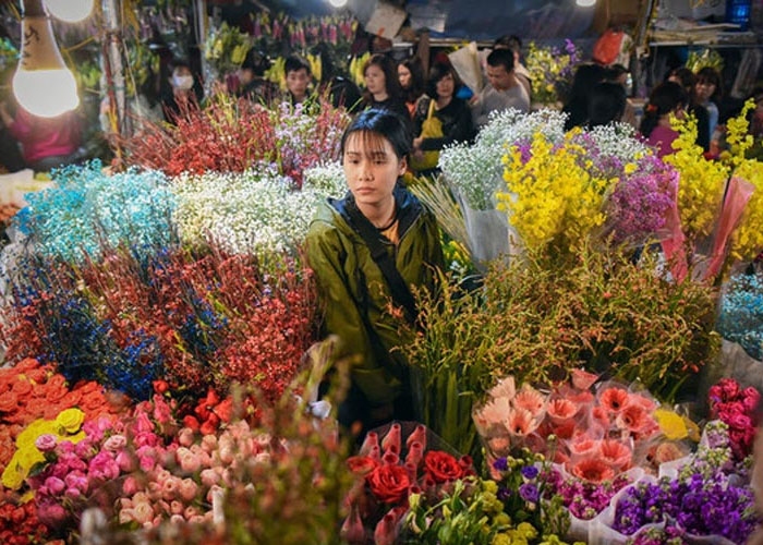 Chợ hoa là nét đặc sắc nhất của Việt Nam trong dịp đón Tết Nguyên đán này. 
