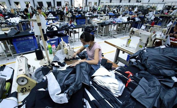 Sản xuất quần áo tại Việt Nam: Ảnh: TTXVN