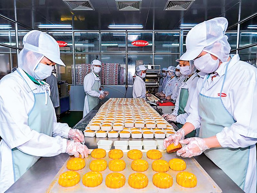 Động thái thoái vốn bất ngờ của Lotte được cho là sẽ chấm dứt nội chiến suốt nhiều năm qua của doanh nghiệp bánh kẹo có thị phần thứ 2 Việt Nam. Ảnh: BBC