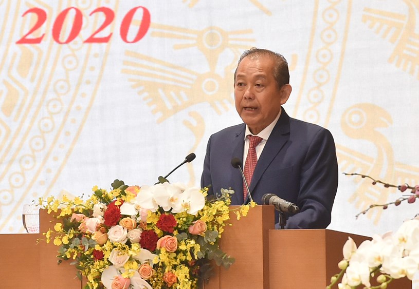 Phó Thủ tướng Thường trực Chính phủ Trương Hòa Bình báo cáo tóm tắt về tình hình kinh tế - xã hội năm 2020 và kế hoạch năm 2021. Ảnh: VGP