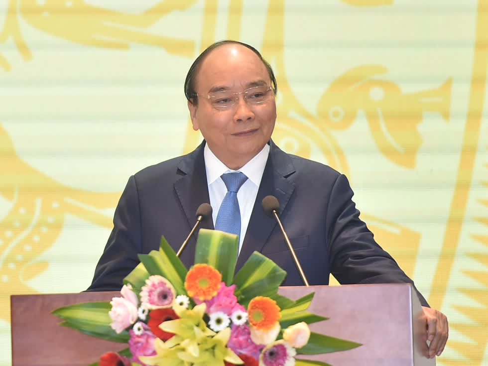 Thủ tướng Nguyễn Xuân Phúc giao nhiệm vụ năm 2021 cho ngành ngân hàng tại hội nghị ngày 26/12. Ảnh: VGP 