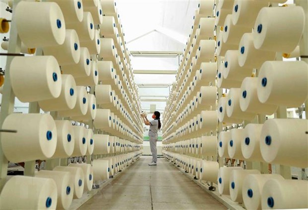 Dây chuyền sợi xuất khẩu tại Công ty TNHH dệt Phú Thọ. Ảnh: TTXVN