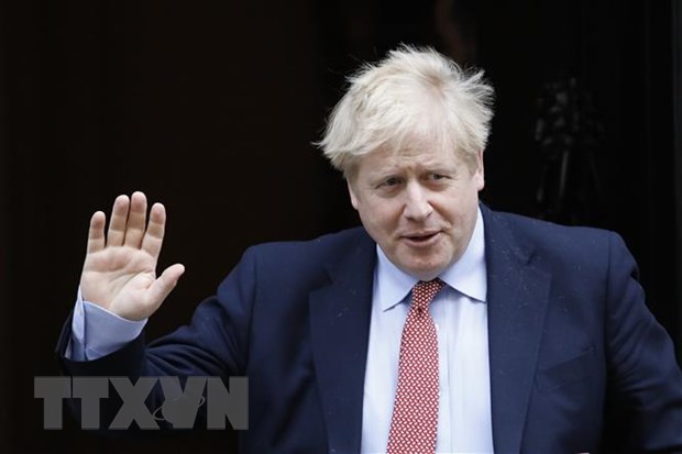   Thủ tướng Anh Boris Johnson sau cuộc họp tại nhà số 10 Phố Downing ở London ngày 18/3/2020.  