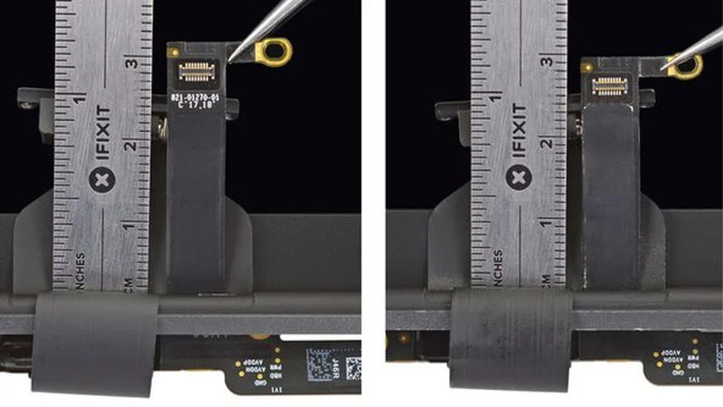   iFixit phát hiện cáp flex MacBook Pro 2018 ở bên trái dài hơn 2 mm.  