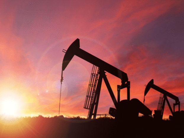 Giá dầu quay đầu tăng trở lại, chứng khoán Mỹ giảm bớt nỗi lo về nguồn cung