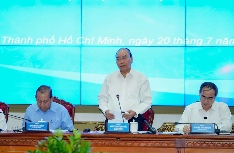 Thủ tướng Nguyễn Xuân Phúc tại cuộc họp. Ảnh: VGP/Quang Hiếu