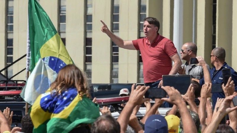   Chính quyền Tổng thống Braizl Jair Bolsonaro bị tố phạm tội cẩu thả trong xử lý đại dịch COVID-19. Ảnh: KT.  