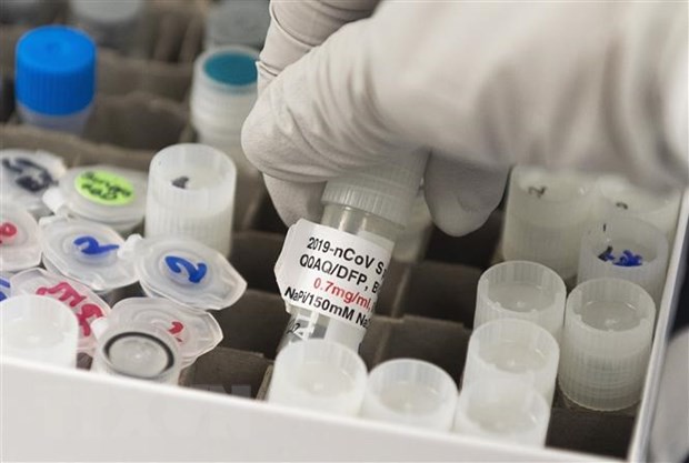 Nghiên cứu sản xuất vắcxin ngừa COVID-19 tại Gaithersburg, Maryland, Mỹ. Ảnh: AFP/TTXVN.