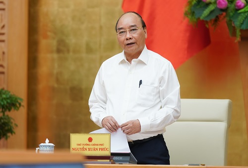 Thủ tướng Nguyễn Xuân Phúc nhấn mạnh xác địch chống dịch COVID-19 là một cuộc chiến trường kỳ, phải chung sống với dịch bệnh cho đến khi có thuốc đặc trị và vaccine. Ảnh: VGP