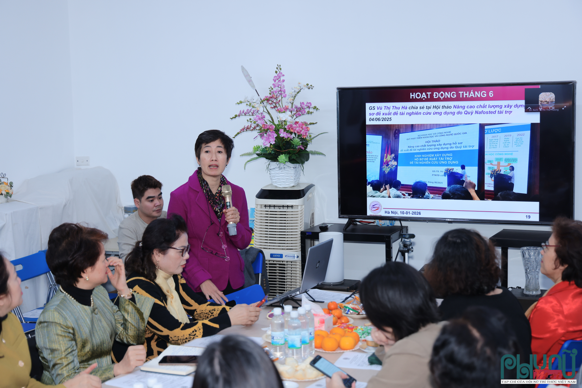 PGS.TS Nguyễn Minh Tân trình bày báo cáo tổng kết hoạt động năm 2025 và định hướng năm 2026