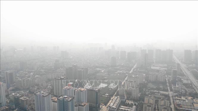 Do những biến động bất thường của yếu tố thời tiết, khí hậu, chất lượng không khí tại Thủ đô Hà Nội có diễn biến xấu. Ảnh minh họa: TTXVN