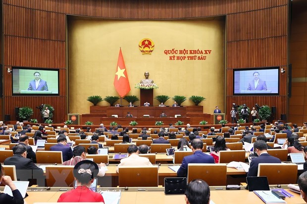 Thủ tướng Phạm Minh Chính trình bày Báo cáo Kết quả Thực hiện Kế hoạch Phát triển Kinh tế-Xã hội năm 2023; Dự kiến Kế hoạch Phát triển Kinh tế-Xã hội năm 2024. (Ảnh: Dương Giang/TTXVN)