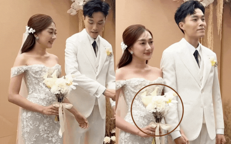 Đám cưới Phương Lan - Phan Đạt: Cô dâu cầm 2 bó hoa cưới, một trong hai mang ý nhắc nhở về sự chung thuỷ