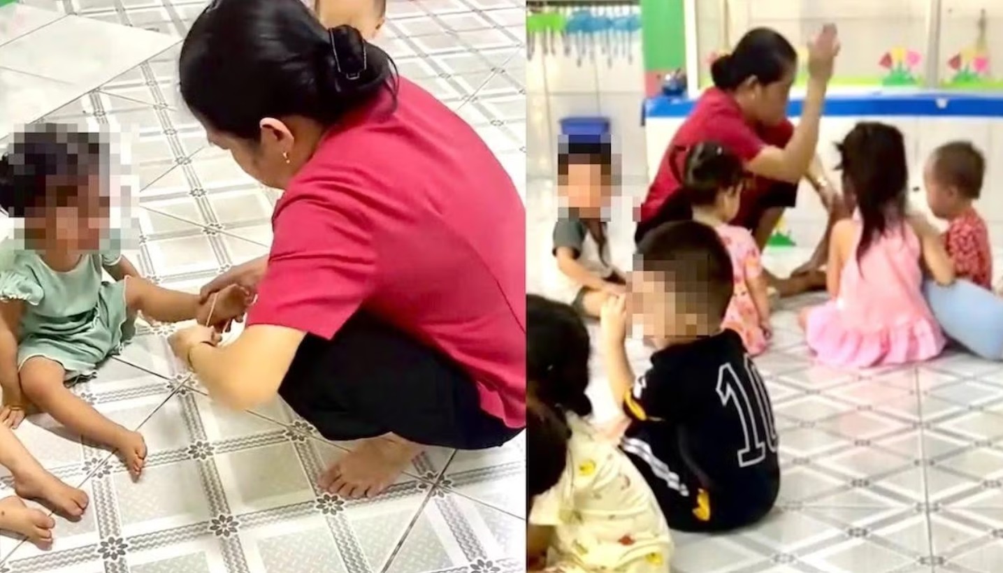Đối tượng Tâm liên tục đánh, dùng dây thun bắn vào chân các cháu bé - Ảnh cắt từ clip