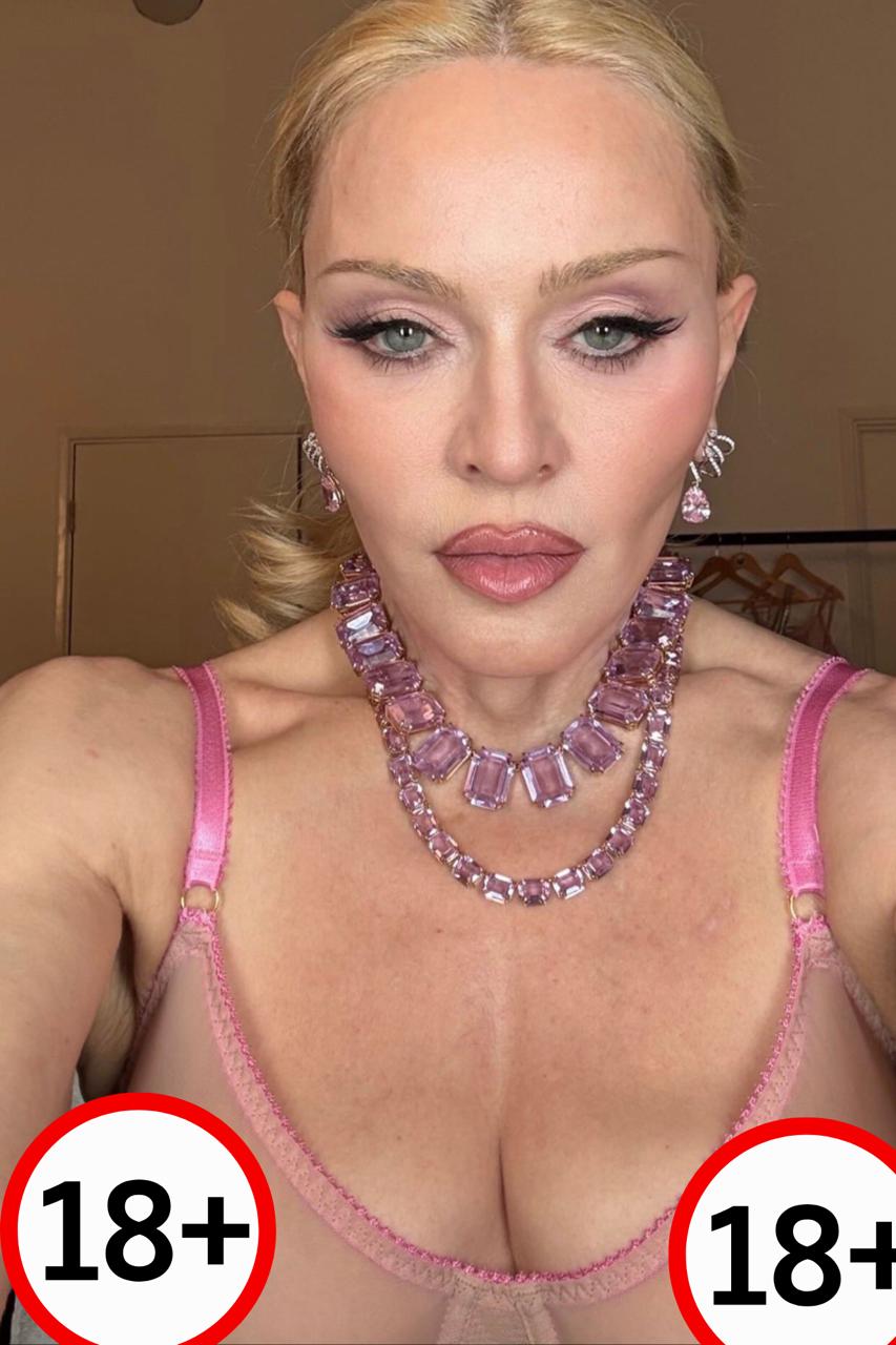 Madonna đăng tải tấm hình selfie mặc một chiếc váy 2 dây viền hồng nhưng toàn bộ phần còn lại là vải xuyên thấu, để lộ hoàn toàn 100% vòng 1 qua camera