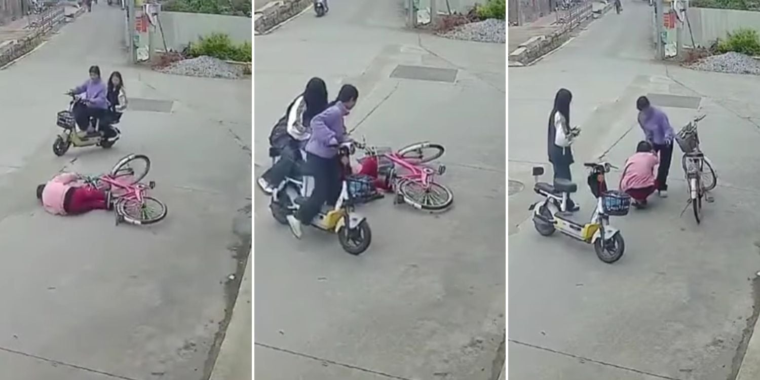 Hai nữ sinh giúp đỡ cụ bà bị ngã xe