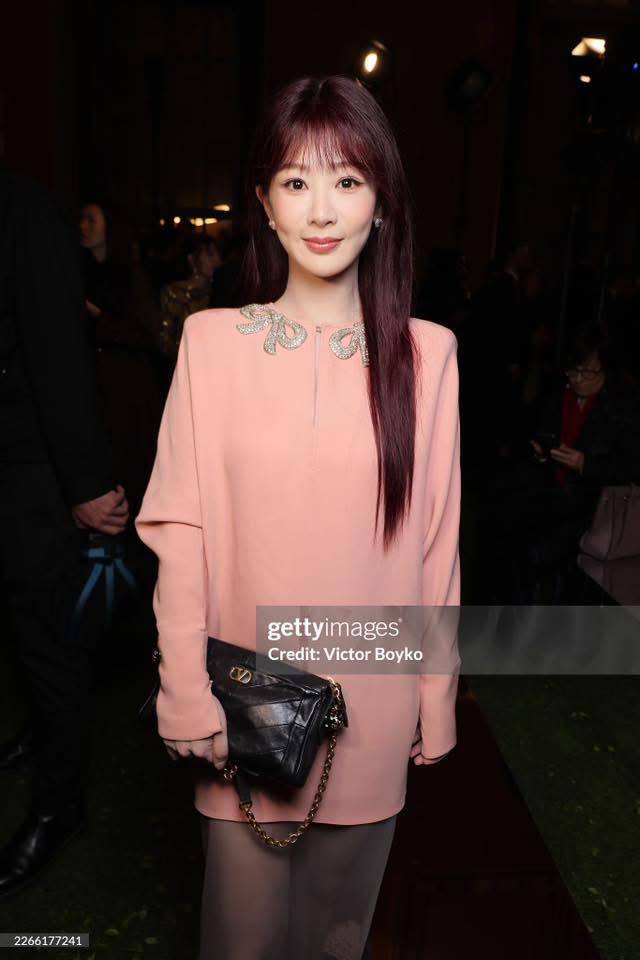 Gương mặt cứng đơ, trông như tượng sáp của Dương Tử qua ống kính Getty Images. (Ảnh: Getty Images)