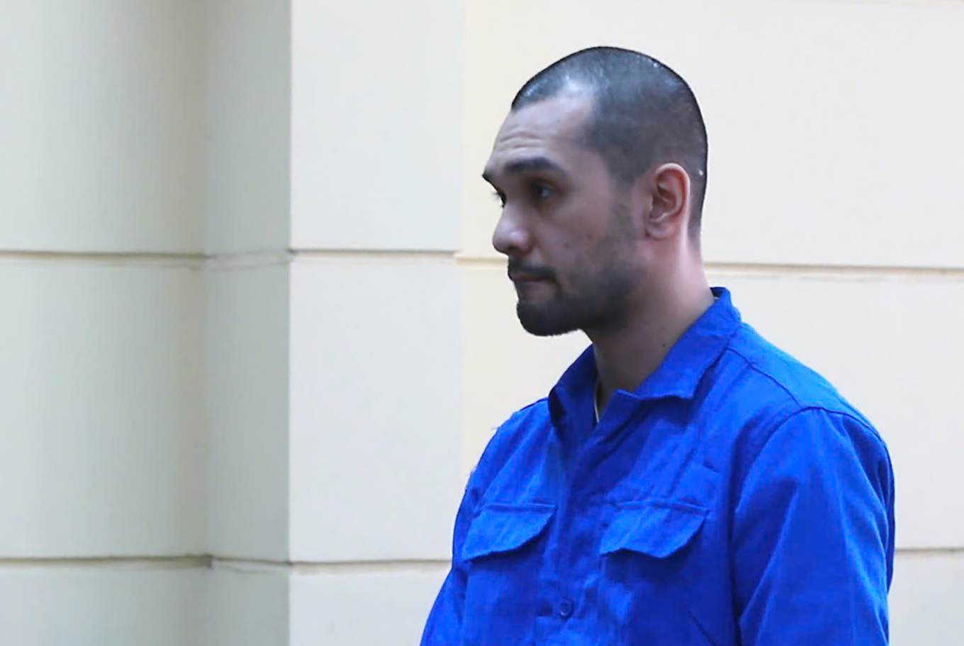 Nhikolai Đinh tại phiên toà xét xử vào tháng 3 năm ngoái