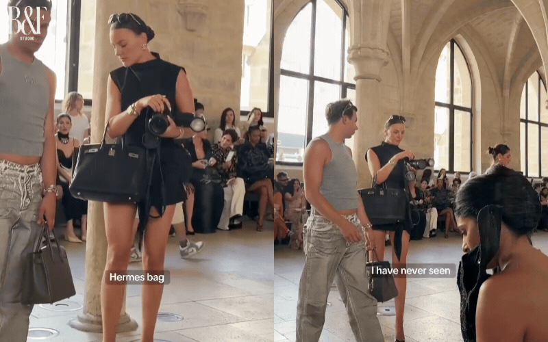 Tại show Rahul Mishra, Robine diện chiếc váy ngắn khoe vóc dáng khoẻ khoắn, đôi chân dài nuột nà. Kết hợp cùng giày cao gót và chiếc túi Hermès Birkin kinh điển trên tay, nữ nhiếp ảnh gia này tạo nên hình ảnh vừa nữ tính, vừa sắc sảo nhưng vẫn giữ được vẻ lạnh lùng đặc trưng của một người đã quá quen thuộc với thế giới thời trang.