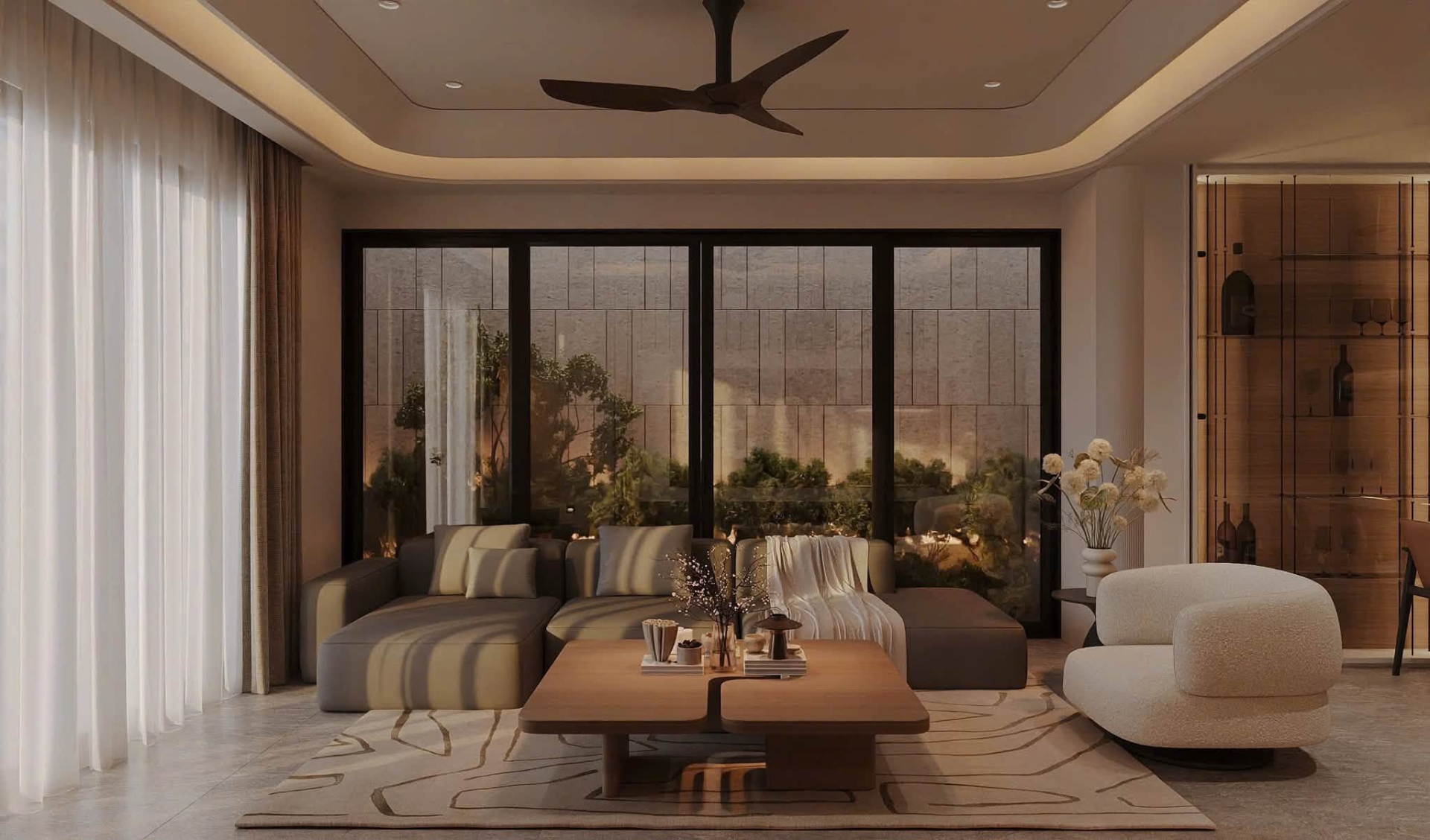 Khu vực sofa đặt cạnh góc cửa kính lớn, hướng tầm mắt ra sân vườn