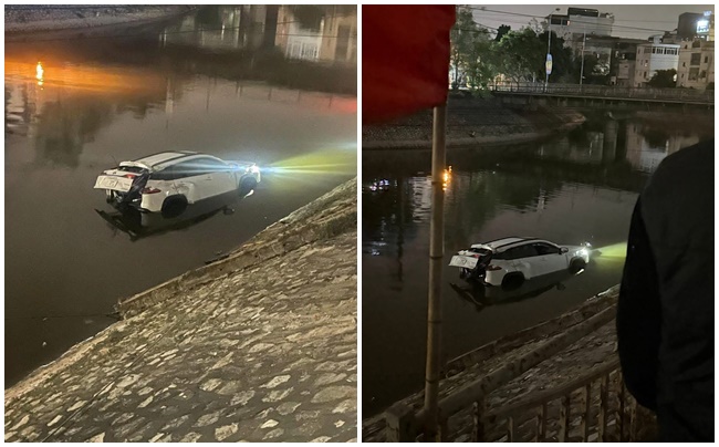 Hiện trường vụ ô tô lao xuống sông Tô Lịch lúc 3 giờ sáng 19/3.