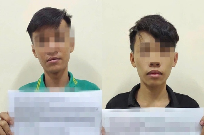 2 đối tượng trong vụ truy đuổi trên đường ĐT747B tại cơ quan công an (Ảnh: Công an phường Tân Khánh).