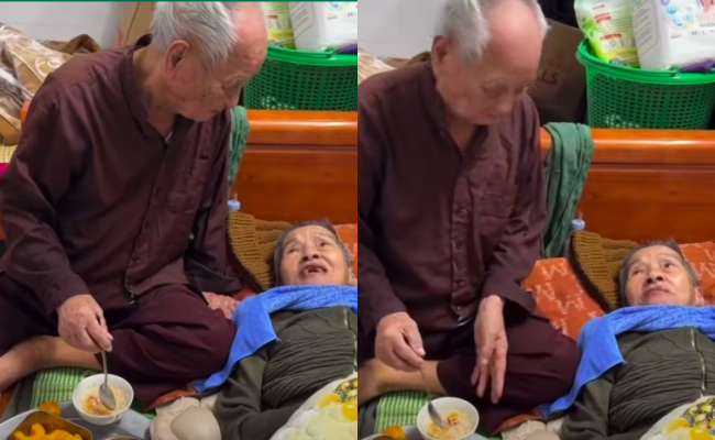 Hình ảnh cụ ông bón cơm cho vợ khiến người ta cảm động. (Ảnh cắt từ clip)