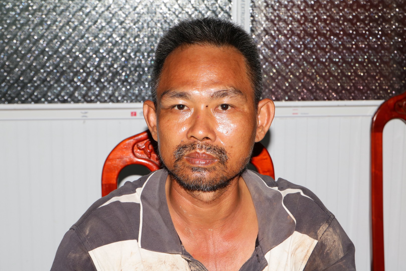 Đối tượng Thái Văn Bình tại cơ quan Công an (Ảnh: Bộ Công an).