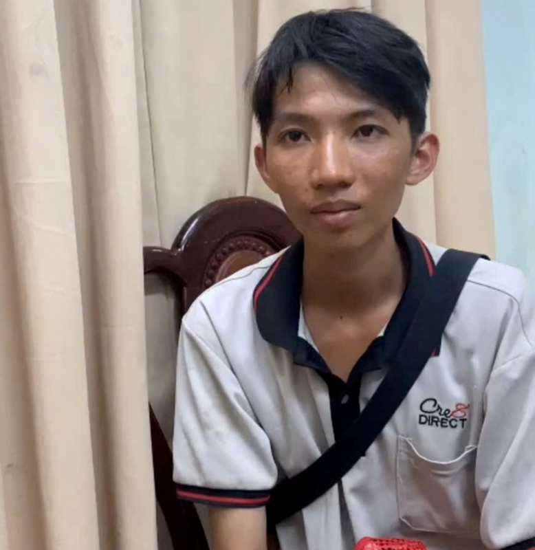 Nguyễn Minh Cảnh tại cơ quan công an - Ảnh: CACC