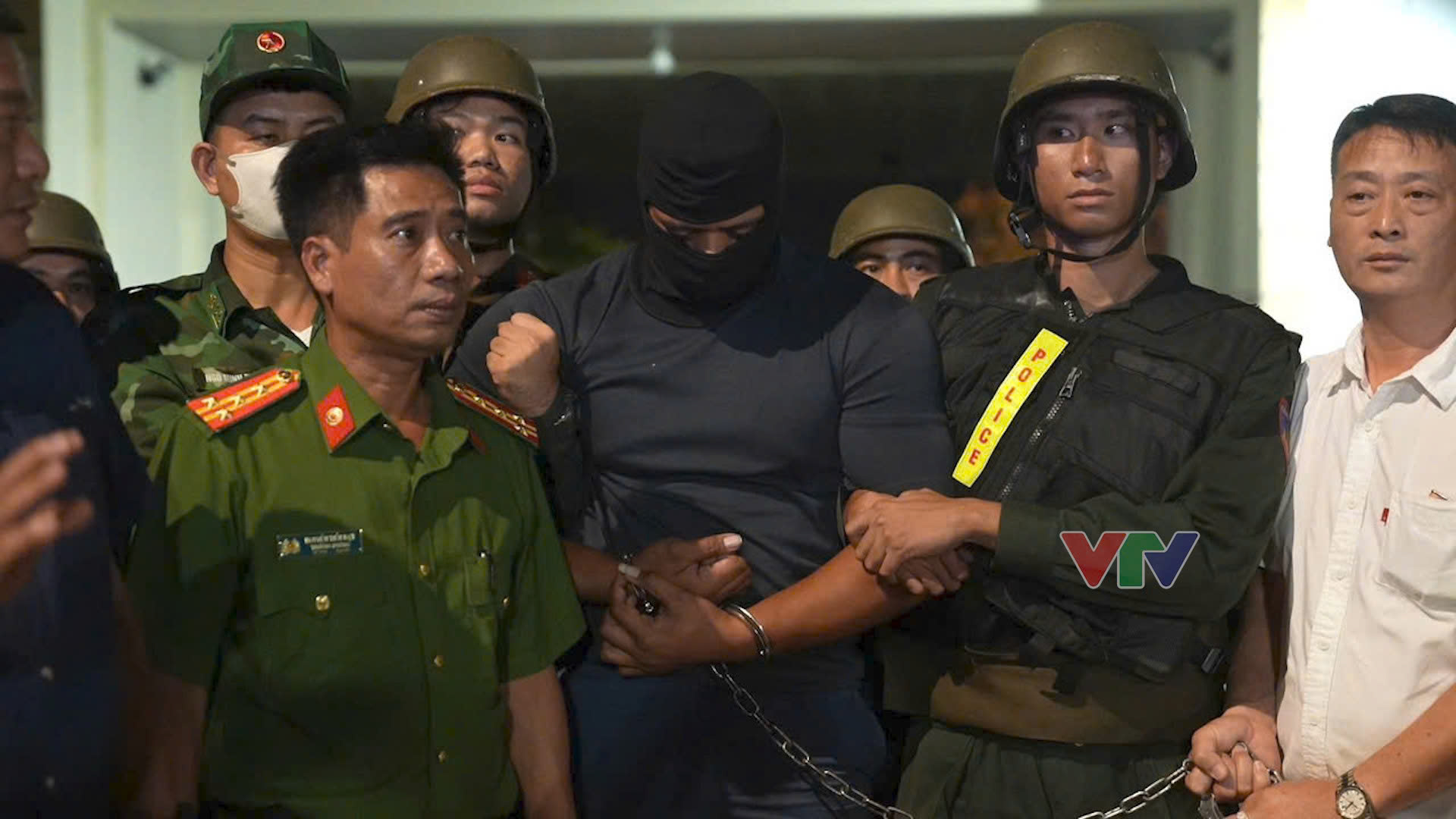 Nghi phạm bị bắt giữ - Ảnh: VTV9