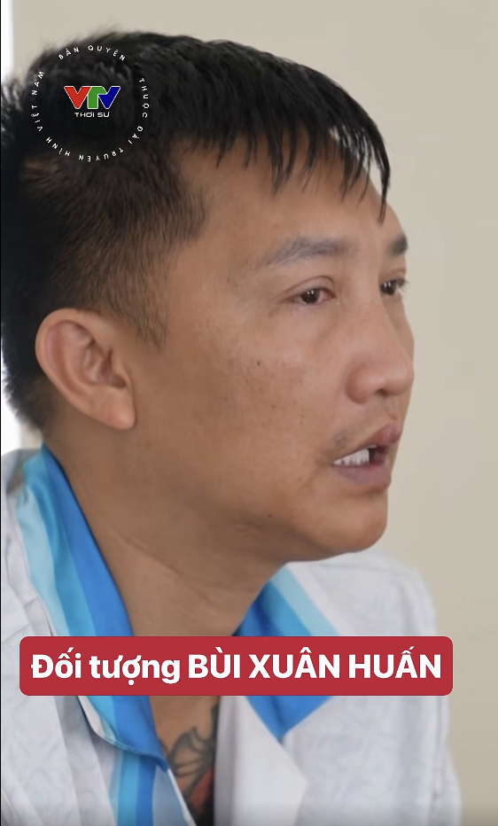 Bùi Xuân Huấn tại cơ quan công an - Ảnh: VTV