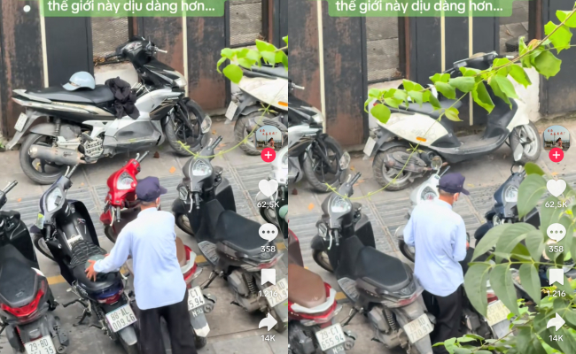 Khoảnh khắc chú bảo vệ lật úp từng chiếc mũ bảo hiểm cho khách trong ngày mưa. (Ảnh cắt từ clip)
