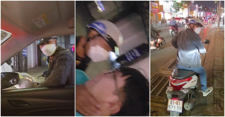  Người đàn ông  đi xe máy bóp cổ, xô ngã tài xế taxi giữa đường. (Ảnh cắt từ clip)