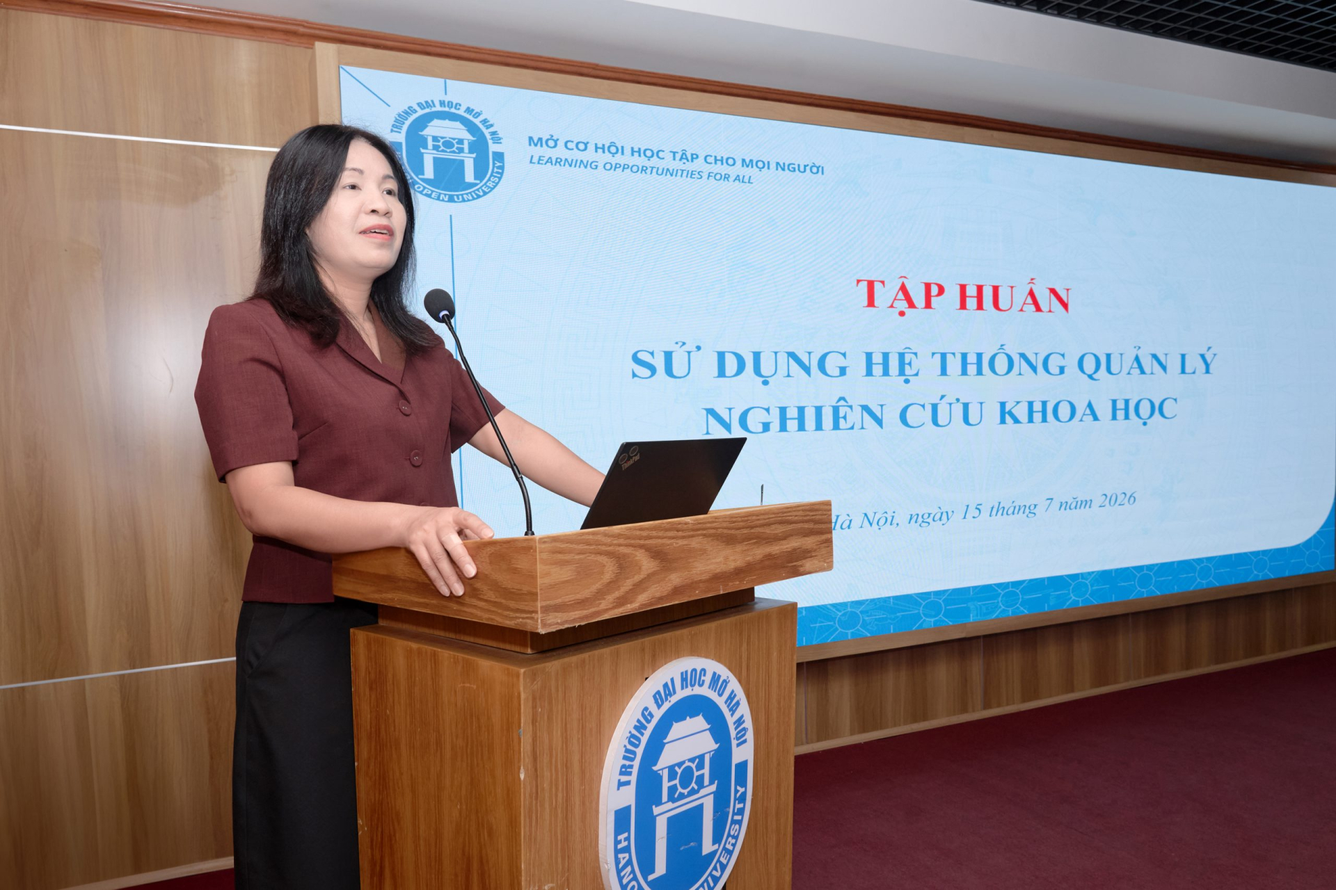 PGS.TS. Phạm Thị Tâm, Trưởng phòng Quản lý Khoa học và Đối ngoại, Trường Đại học Mở Hà Nội, tại một hoạt động của trường tháng 7/2026. Ảnh: Trường Đại học Mở Hà Nội.