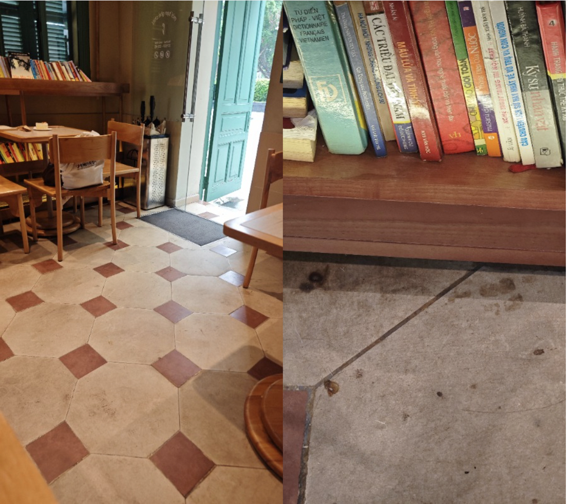 Khu vực giá sách trang trí cũng có những vết ố bẩn loang lổ trên mặt sàn.