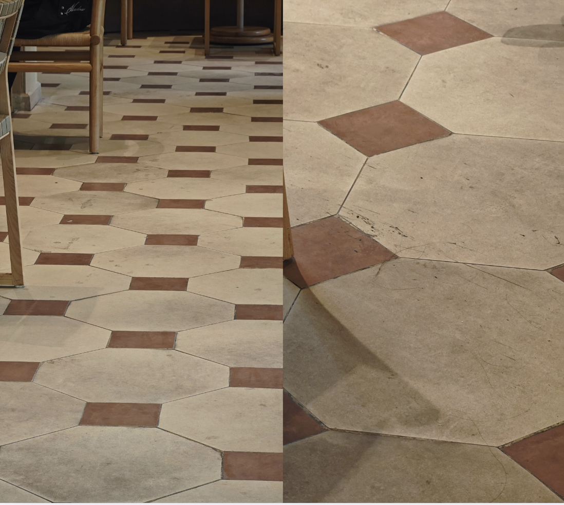 Cận cảnh cửa kính hoặc sàn nhà có vết ố tại chi nhánh Tây Hồ.