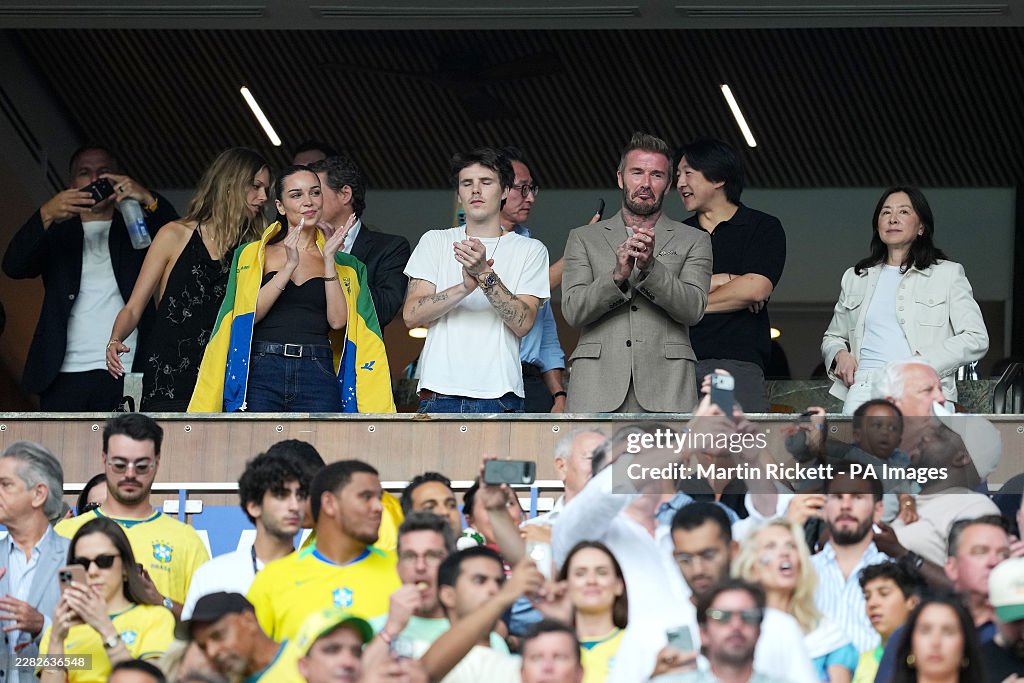 Beckham đi cùng con trai Cruz (Ảnh: Getty)