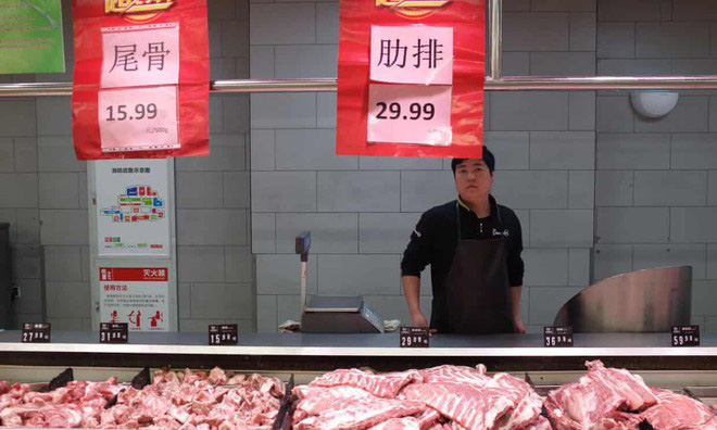   Quầy thịt tại siêu thị ở Bắc Kinh. (Ảnh: EPA).  