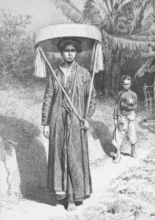 Hình ảnh một phụ nữ Hà Nội với chiếc nón ba tầm.