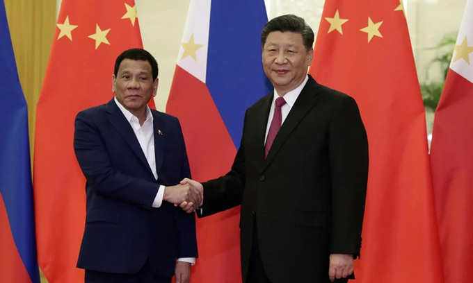   Chủ tịch Trung Quốc Tập Cận Bình (phải) và Tổng thống Philippines Rodrigo Duterte tại Đại lễ đường Nhân dân, Bắc Kinh tháng 4/2019. Ảnh: Reuters.  