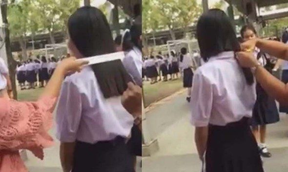 Một nữ sinh Thái Lan bị giáo viên cắt tóc ngay giữa sân trường vì không để đúng độ dài. Ảnh: Tasty Thailand.