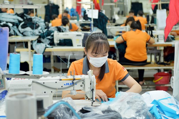 Sản xuất hàng dệt may xuất khẩu. (Nguồn: Vietnam+)