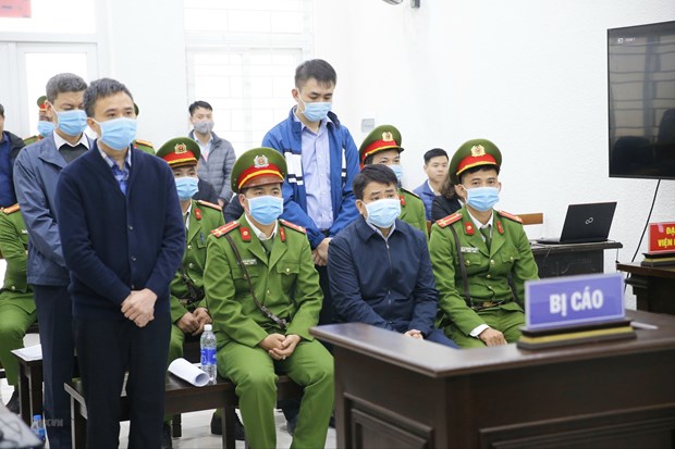 Các bị cáo tại phiên tòa xét xử sơ thẩm vụ án 'Chiếm đoạt tài liệu bí mật nhà nước' liên quan đến vụ án Công ty Nhật Cường. (Nguồn: TTXVN)