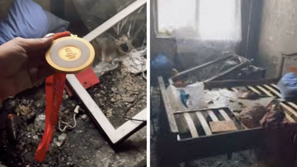   Nữ VĐV 30 tuổi Daria Shkurikhina và chiếc huy chuong Olympic trong căn nhà bị cháy của mình - Ảnh: Getty Images  