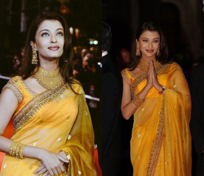         Năm 2002, Hoa hậu Thế giới 1994 Aishwarya Rai lần đầu tiên tham dự Liên hoan phim Cannes. Cô mang đến sự kiện điện ảnh thường niên này bộ trang phục truyền thống Ấn Độ (sari) màu vàng rực rỡ, kết hợp với trang sức vàng.         