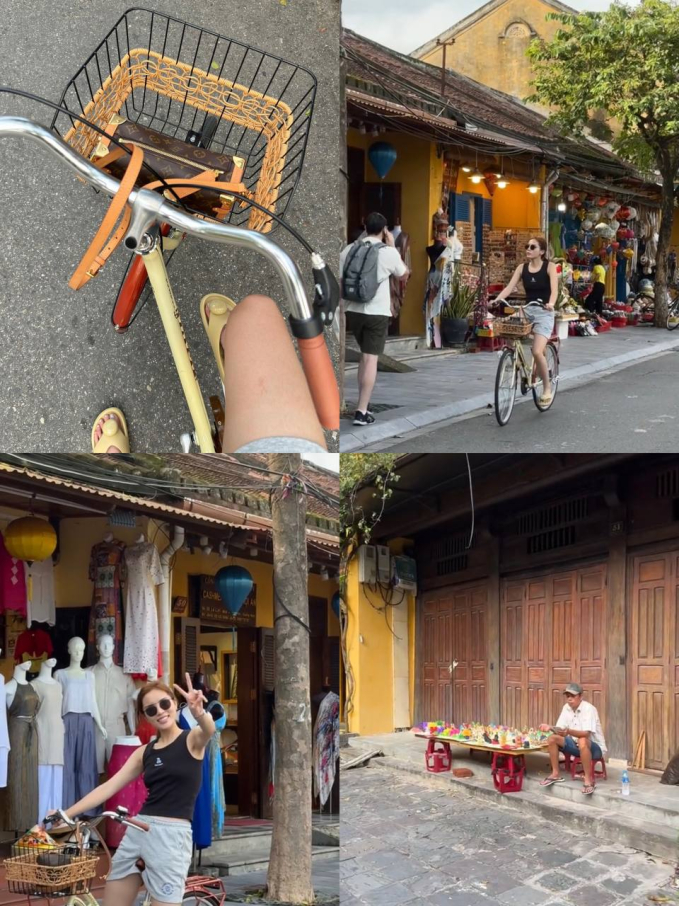   Hoa hậu Việt Nam 2014 diện trang phục thoải mái, đạp xe rong chơi ở phố cổ Hội An.  