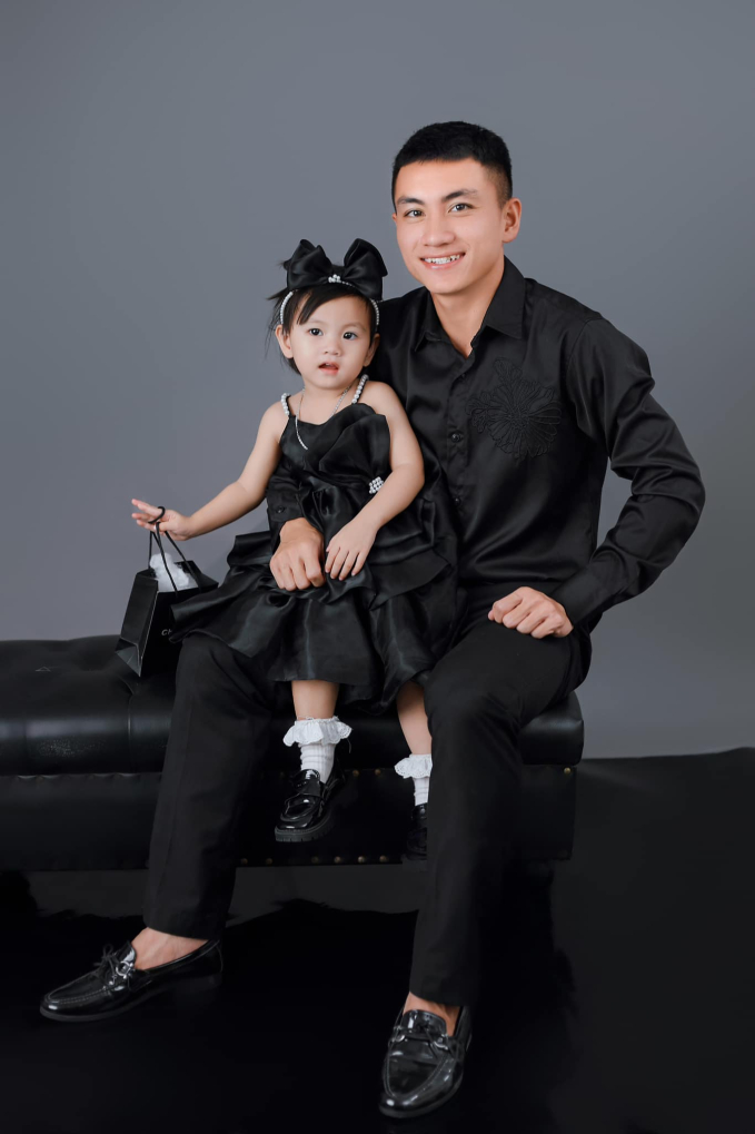 Minh Quang và con gái 